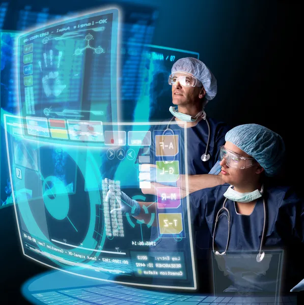 Doctors with screens — Stock Photo, Image