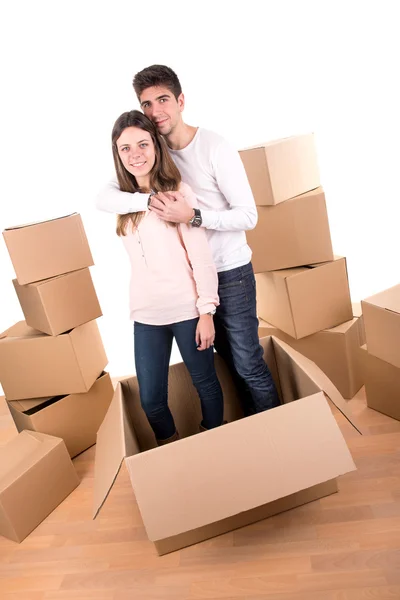 Happy couple with boxes — Stock Photo, Image