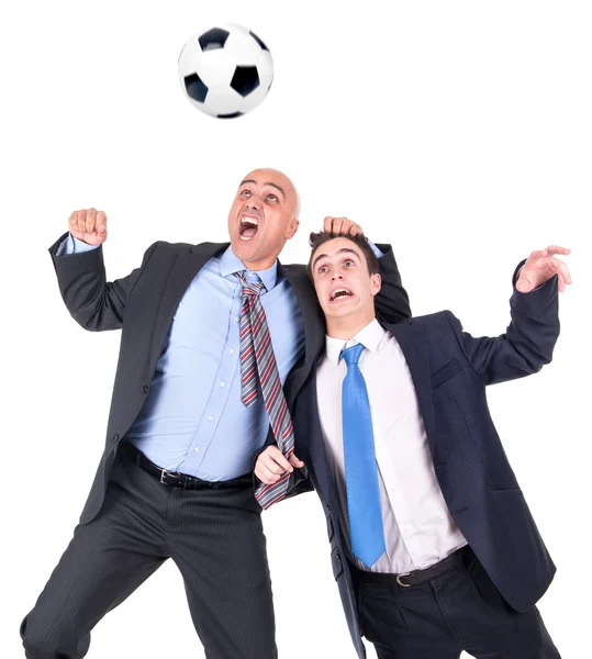 Hommes d'affaires jouant au football — Photo