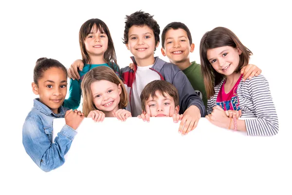 Kids over white board — Stock Photo, Image