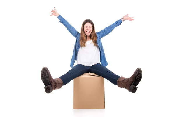 Girl with cardboard boxes unpacking — Stock Photo, Image