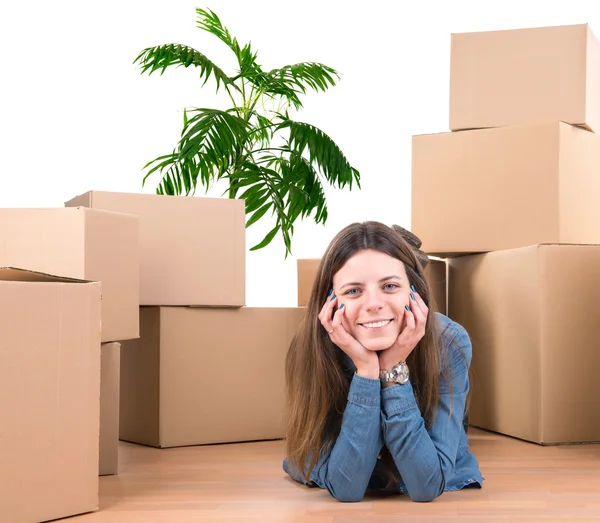 Beautiful girl with cardboard boxes — Stock Photo, Image