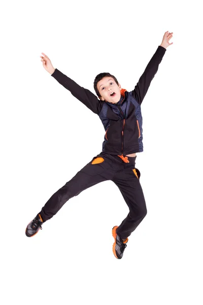 Хлопчик, стрибки — стокове фото