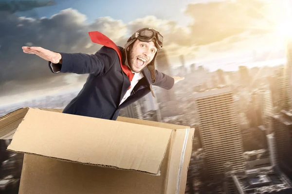 Businessman Flying Carboard Box Skies — Stock Photo, Image