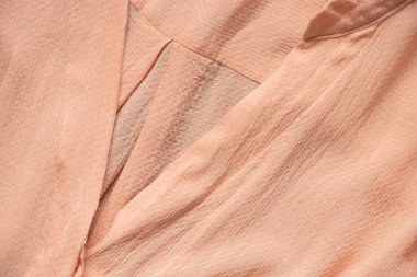 Arka plan için buruşuk ipek bluz, kadın kıyafeti, arka plan olarak ipek kumaş.