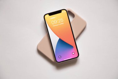 Ukrayna Dnipro 05.11.2021 - iphone 12s mini and case on isolated white background, new phone