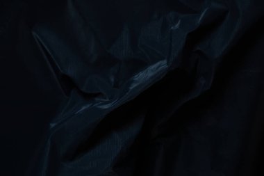 koyu mavi buruşuk kumaş, mavi arka plan yakın plan, kaba arkaplan mavi