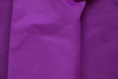 Arkaplan olarak buruşmuş leylak kumaş, leylak pamuk kumaş, arka plan güzelliği ve moda.