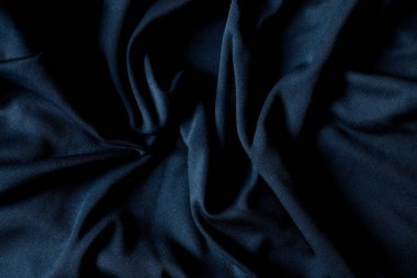 Arkaplan olarak koyu mavi kırışık kumaş, mavi kumaş arkaplan, arkaplan ve doku