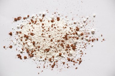 Arkaplanda kakao ile karıştırılmış un, arkaplan için dağınık toz.