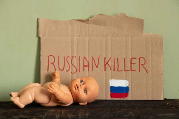 Znamení Textem Ruský Zabiják Vedle Něj Vlajka Ruska Leží Podlaze — Stock fotografie