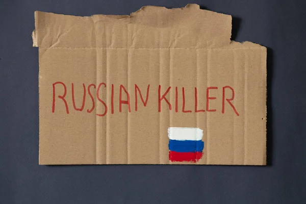 Ruský Vrah Napsán Papíře Ruská Vlajka Jako Pozadí Protestní Akce — Stock fotografie