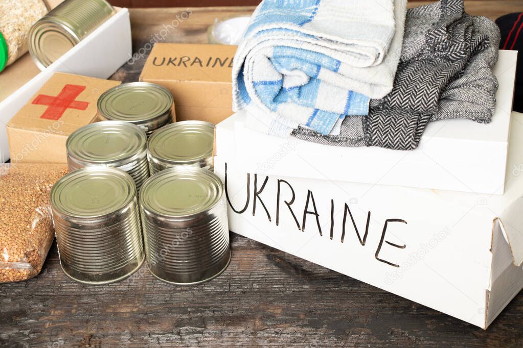 Collecting a humanitarian food set to help people who suffered during the war at the hands of Russia, stop the war in Ukraine, humanitarian aid 2022