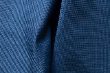 Arka plan için koyu mavi buruşuk kumaş, arka plan makro fotoğrafı için kumaş