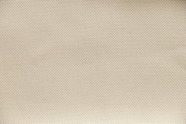 Arkaplan ve doku makro fotoğrafı olarak açık bej kumaş