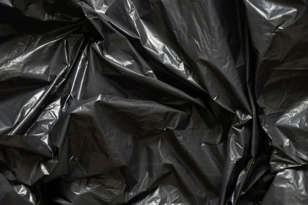 Zwarte Gerimpelde Folie Als Achtergrond Zwarte Verpakking Voor Achtergronden — Stockfoto