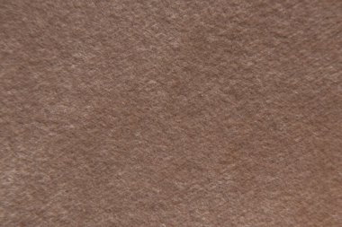 Makro fotoğraf arkaplanı olarak döşenmiş kahverengi kumaş, döşeme mobilyalarına örnek olarak kumaşlar