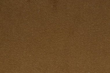 Makro fotoğraf arkaplanı olarak döşenmiş kahverengi kumaş, döşeme mobilyalarına örnek olarak kumaşlar