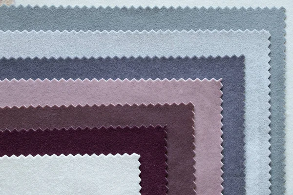 Mobilya döşemeleri için farklı renklerde kadife yumuşak kumaş paleti. Arka plan yakın plan için moda kumaşı.