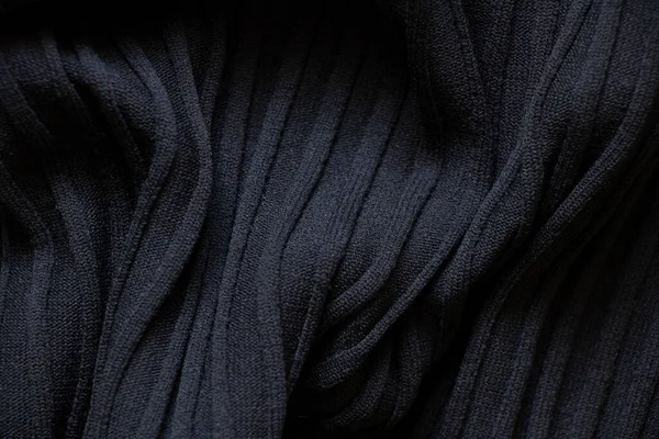 Černá Vlnitá Tkanina Jako Pozadí Zavřít Textil Móda — Stock fotografie