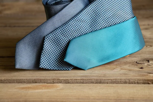 Three Blue Ties Lie Wooden Table Different Men Ties Close — Stock Fotó