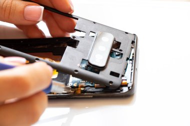 Disassembled mobile phone, phone repair and maintenance, service