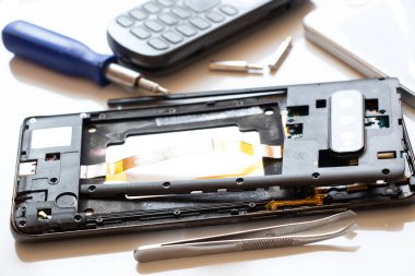 Disassembled mobile phone, phone repair and maintenance, service