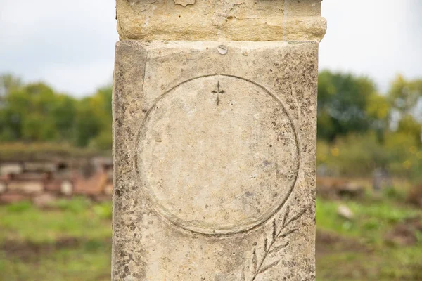 Old cemetery of Polish Jews in Ukraine. Ancient abandoned graves. Cemetery sculpture of the 18th and 19th centuries,Cemetery in Ukraine