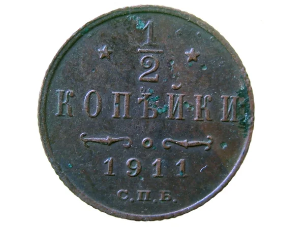 Старая монета в полпенни — стоковое фото