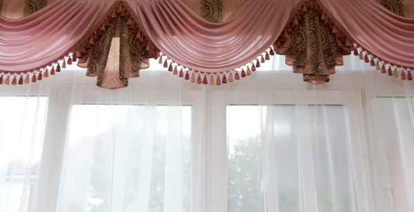 Window decoration - pink lambrequin with drapery — Stock Photo, Image