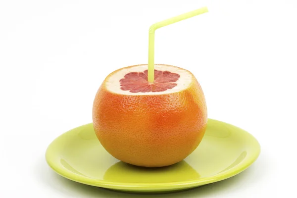 Sappige grapefruit met stro — Stockfoto