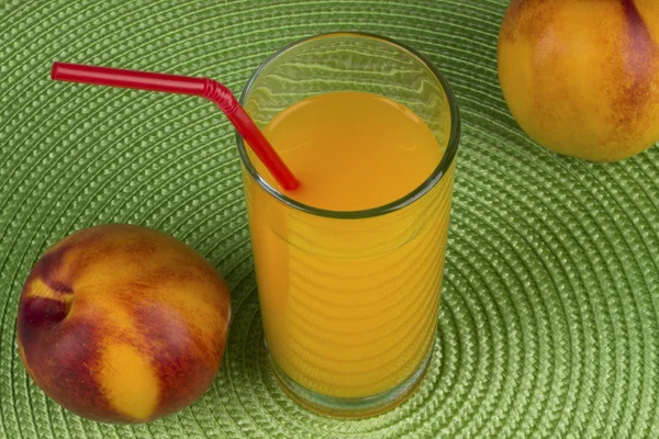 Uppfriskande nektarin juice — ストック写真