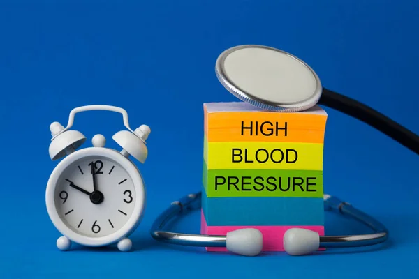 High Blood Pressure Text Note Stethoscope Bells Clock —  Fotos de Stock