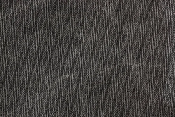 Abstract texture of scratches on black fabric and blank space for the text. Modern trendy design