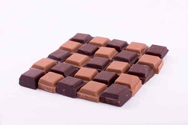 Pieces of dark and milk chocolate — Stock Photo, Image