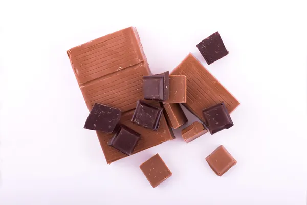 Pedaços de chocolate escuro e leite e maçapão — Fotografia de Stock