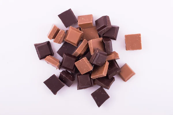 Pieces of dark and milk chocolate — Stock Photo, Image