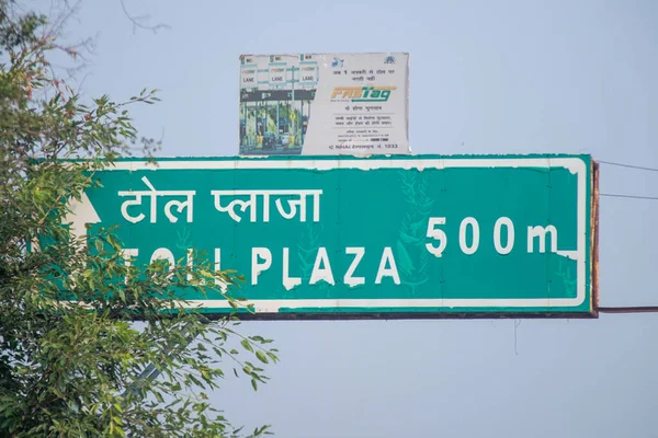 Congested traffic jam cars in front of a toll booth showing the new RFID based payment system FASTag along with the logo for the national highway authority of India NHAI — 스톡 사진