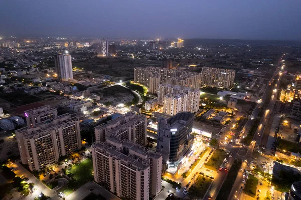 Aerial Drone Shot Showing Brightly Lit Orange Streets Skyscrapers Towers — ストック写真