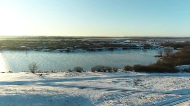 Filming Air Frozen River Snow Covered Meadow — Stock Video