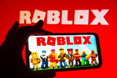 October 7, 2021, Brazil. In this photo illustration the Roblox logo seen displayed on a smartphone clipart