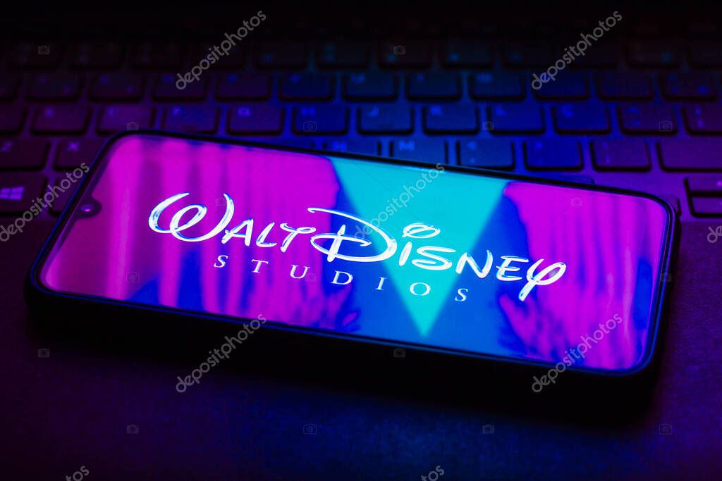 October 7, 2021, Brazil. In this photo illustration the Walt Disney Studios logo seen displayed on a smartphone