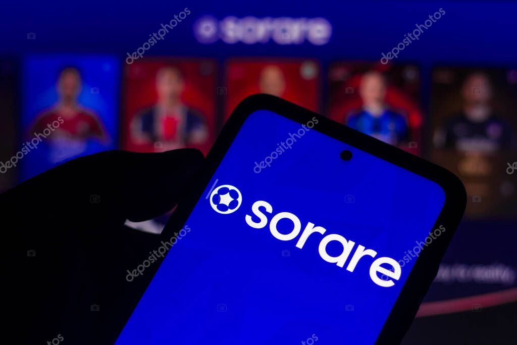 October 13, 2021, Brazil. In this photo illustration, Sorare logo seen displayed on a smartphone and webpage game the background