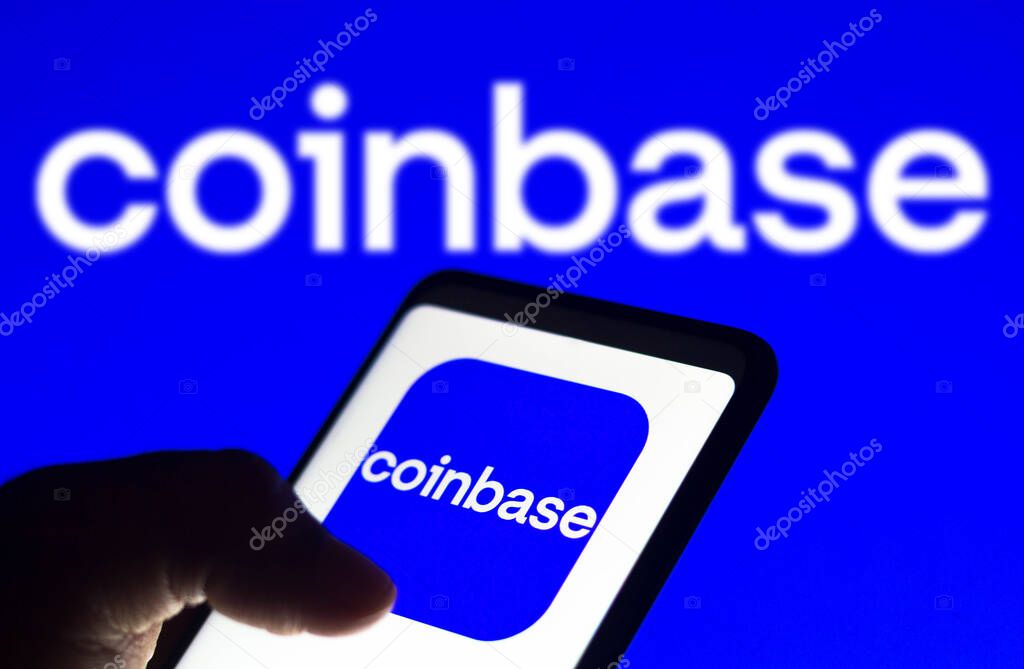 December 21, 2021, Brazil. In this photo illustration the Coinbase logo seen displayed on a smartphone and on the background