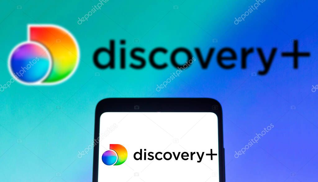 February 3, 2022, Brazil. In this photo illustration, the Discovery + (Discovery Plus) logo is displayed on a smartphone screen and in the background