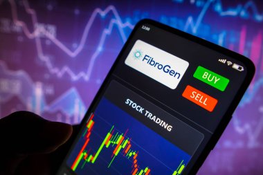 May 11, 2022, Brazil. In this photo illustration the stock trading graph of FibroGen seen on a smartphone screen