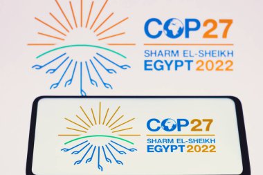 June 14, 2022, Brazil. In this photo illustration, the 2022 United Nations Climate Change Conference COP27 logo is seen on a smartphone screen clipart
