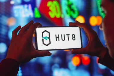 July 19, 2022, Brazil. In this photo illustration the Hut 8 Mining logo seen displayed on a smartphone screen