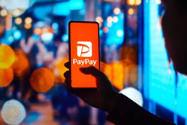 July 27, 2022, Brazil. In this photo illustration, the PayPay Corporation logo is displayed on a smartphone screen