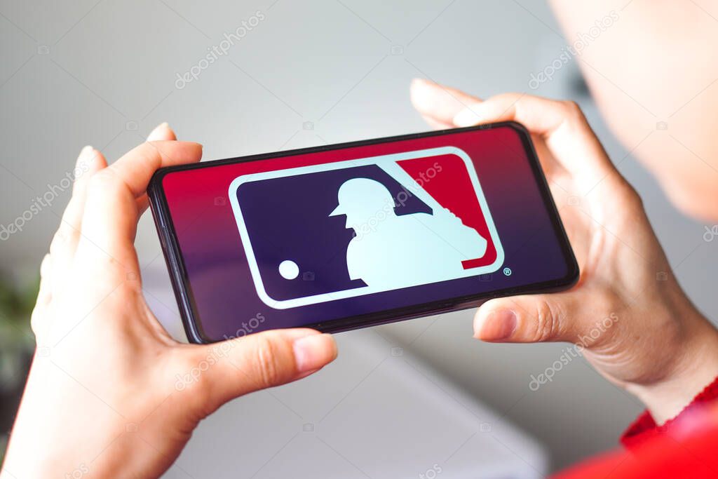 July 29, 2022, Brazil. In this photo illustration, the Major League Baseball (MLB) logo is displayed on a smartphone screen